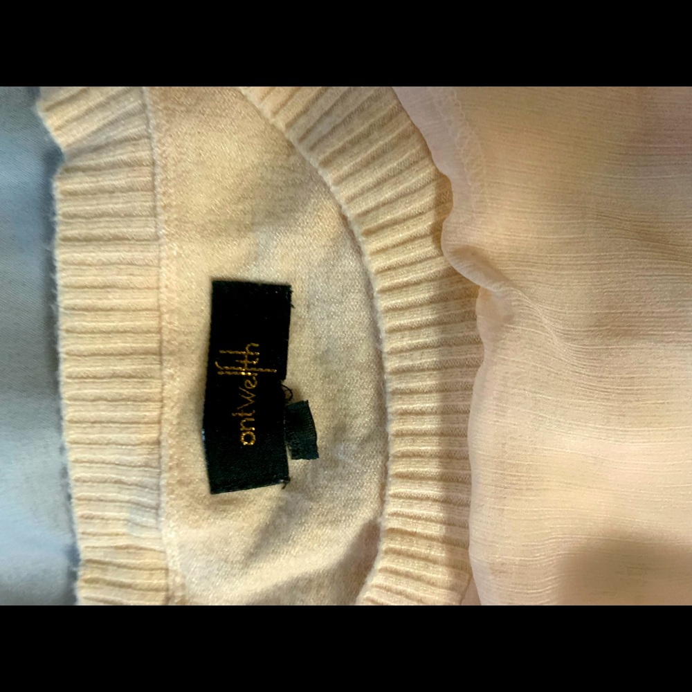 Pale pink long sleeve top